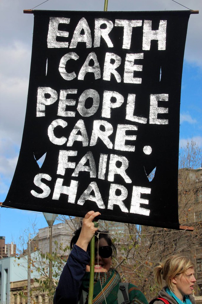 "Earth Care People Care Fair Share - Melbourne World Environment Day 2011" by John Englart (Takver) is licensed under CC BY-SA 2.0.